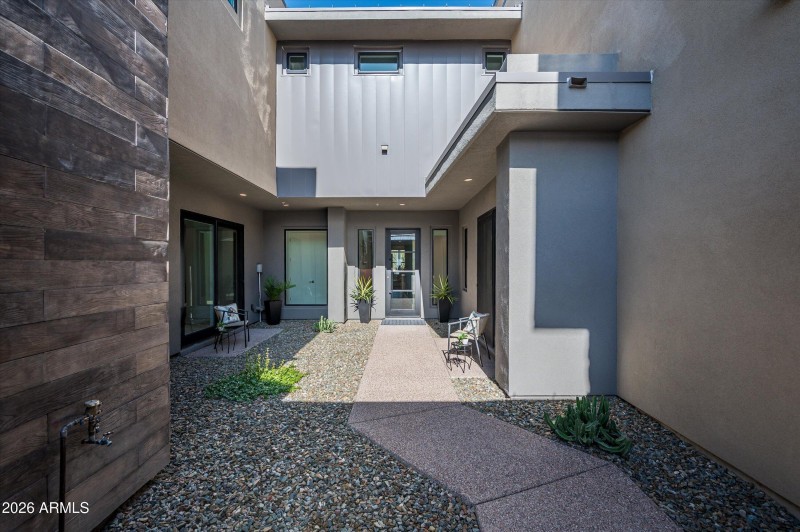 Entry through courtyard
