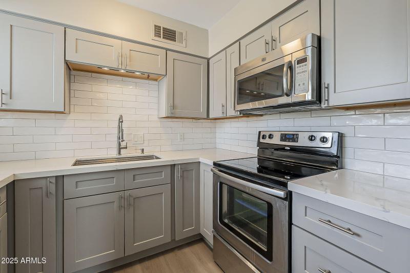Modern Kitchen With Quartz Counters