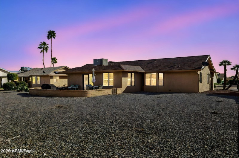 Back of home-or-mls-12402-w-westgate-dr