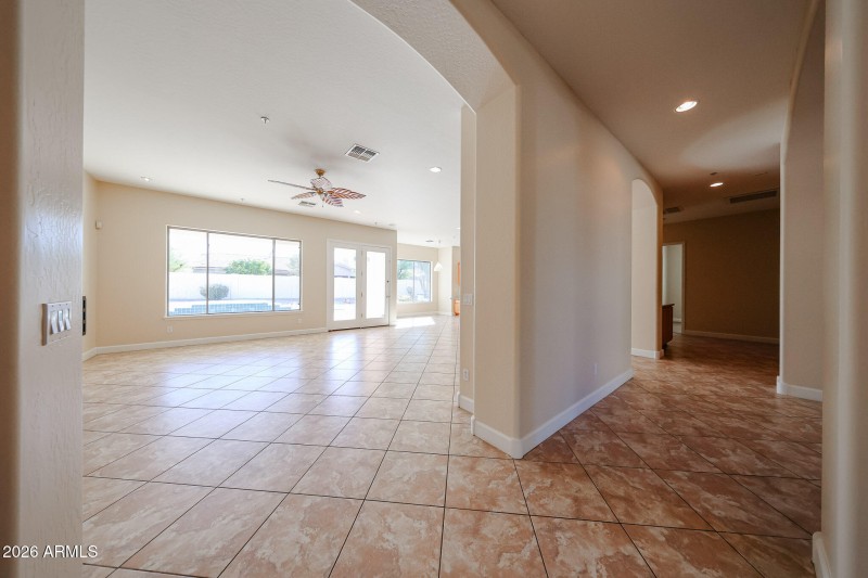Hallway to basement and Bedrooms