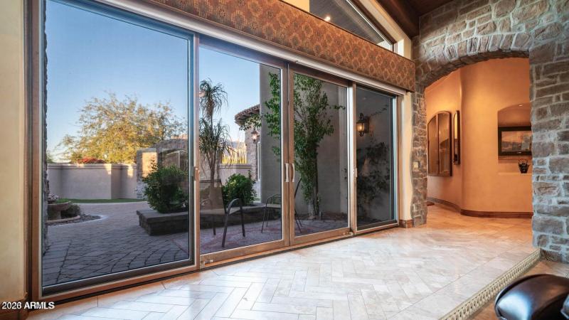 SLIDERS OPEN TO FRONT COURTYARD