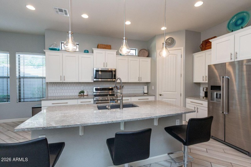 Tons of Granite and Cabinets