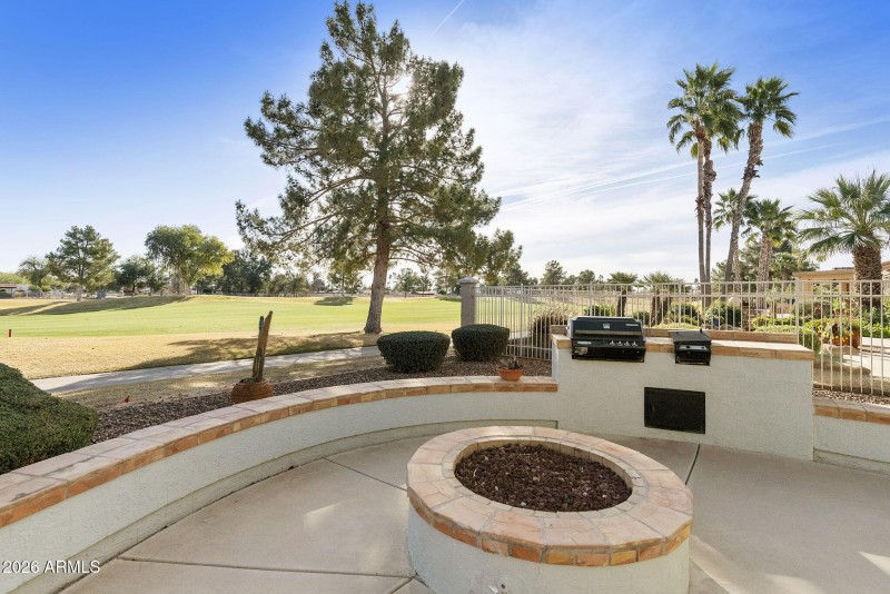 Patio with firepit and BBQ
