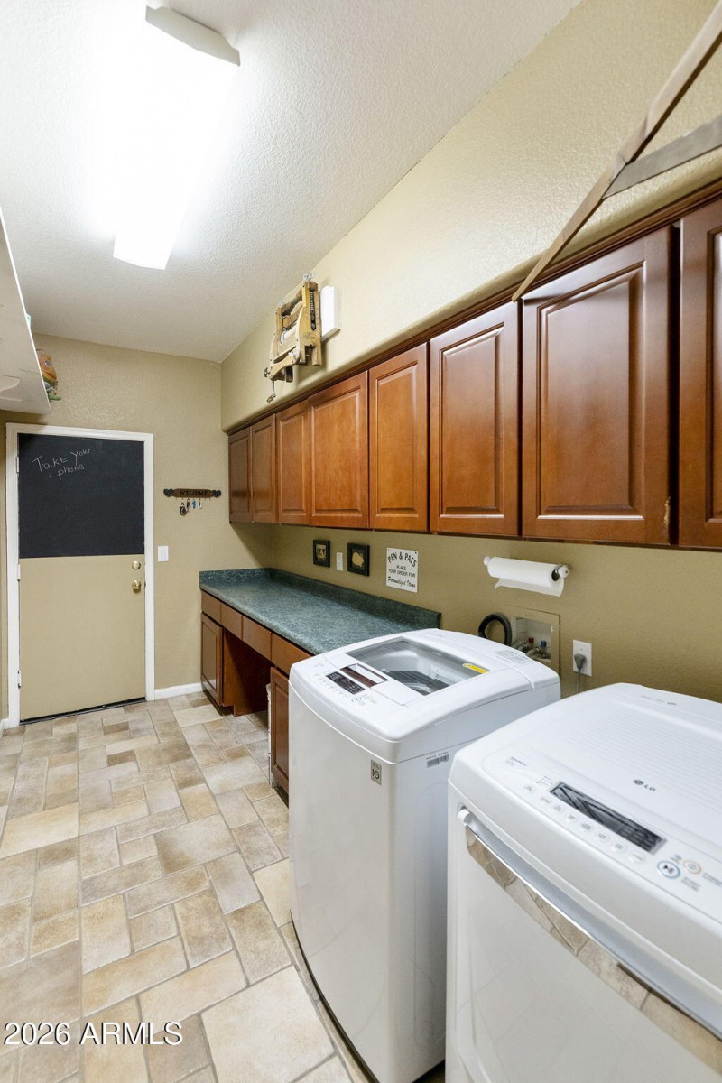 Laundry room with cabinets