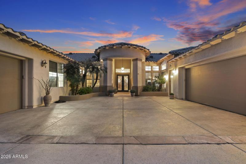 Expansive Driveway & Dual Garages