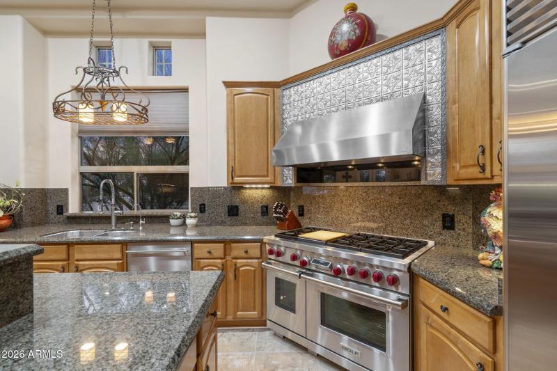 Kitchen w Wolf Range & Stainless Hood