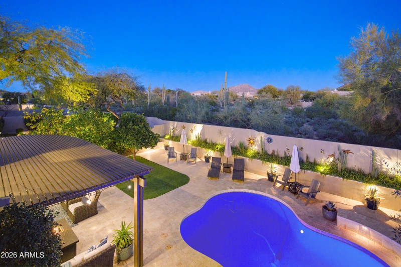 Resort-Style Backyard at Dusk