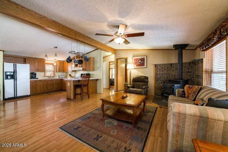 8 - Living Area & Kitchen From Front Ent