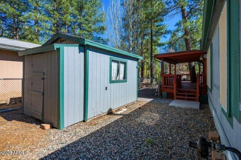 31 - Fenced In Side Yard and Shed