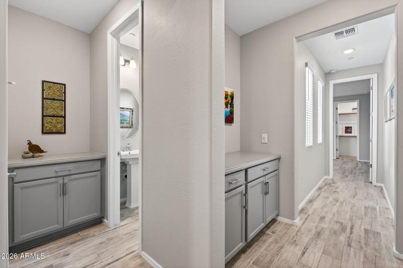 Key Drops off Hallway towards 1/2 bath