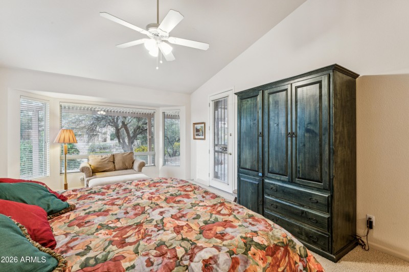 WALL OF WINDOWS AND EXIT TO BACKYARD