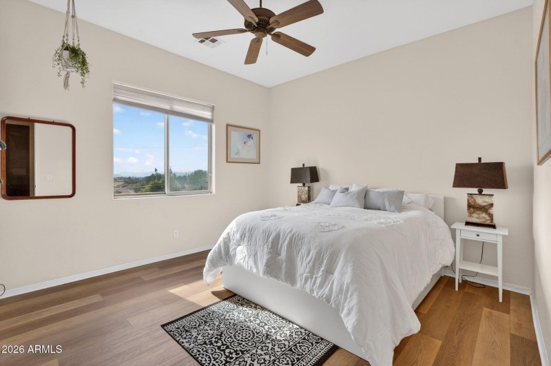 Sunlit Bedroom with Views