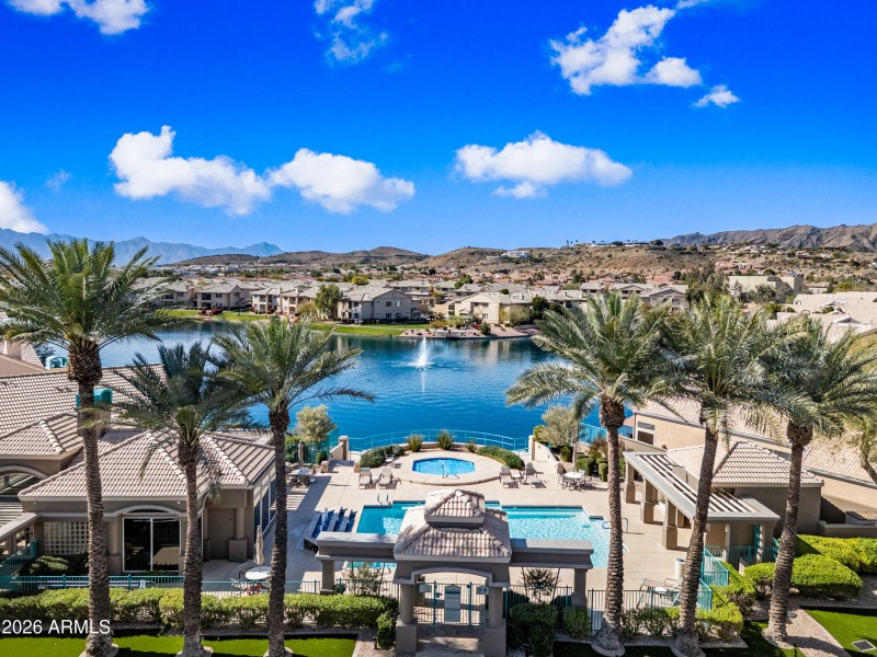 Steps from the pool, clubhouse, and lake