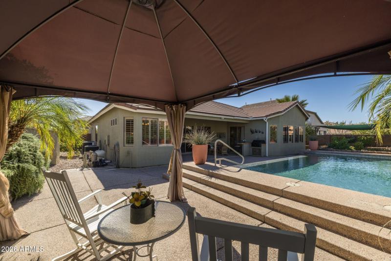 Replace with a drink under the cabana