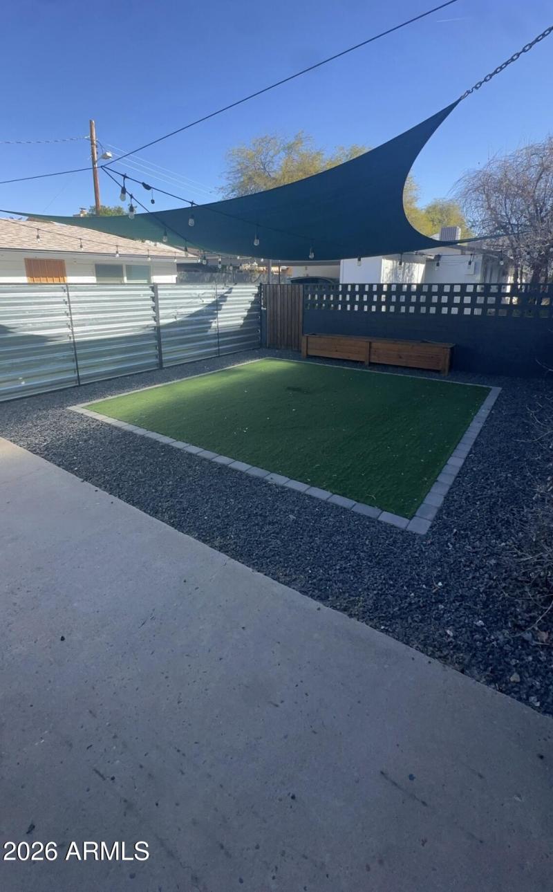Private Patio + Turf Lounge