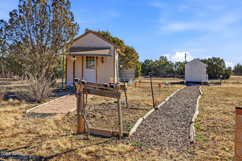 Walkway to well house and craft shed