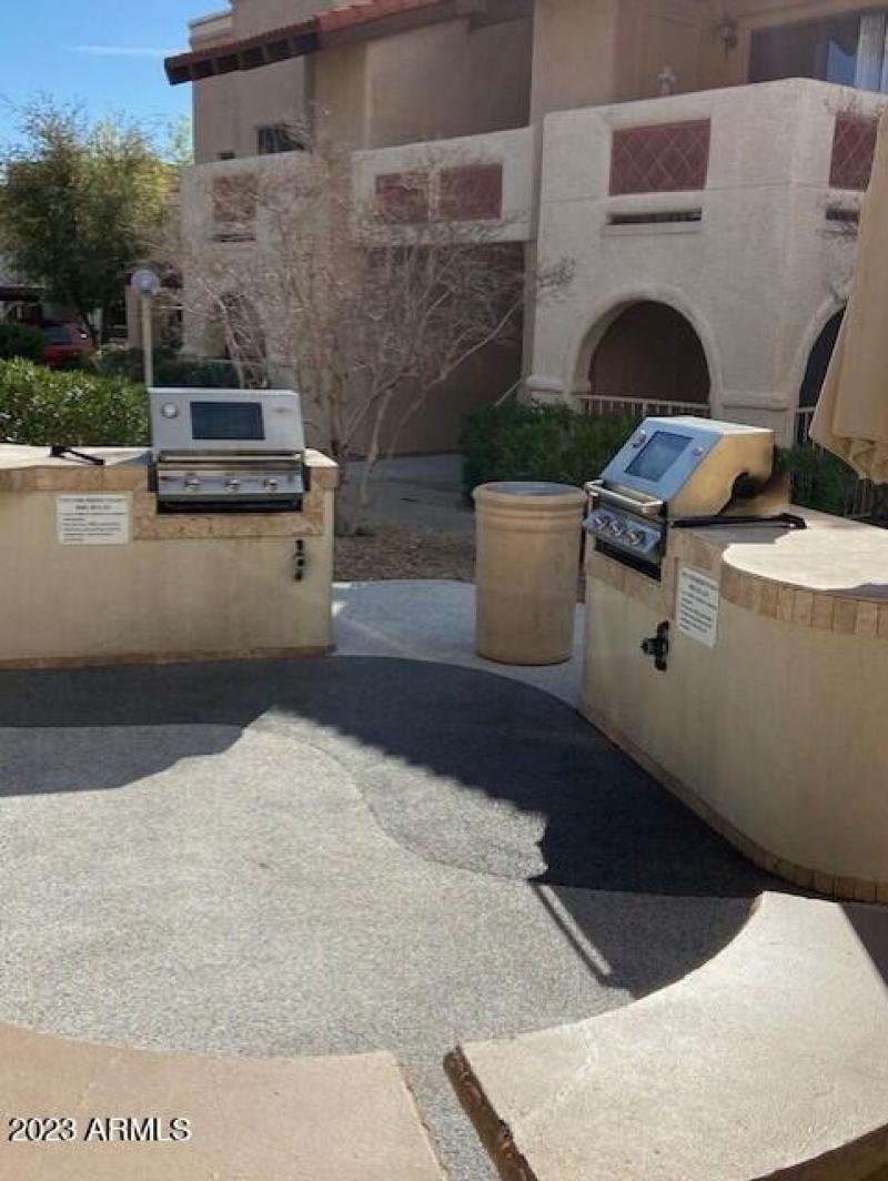 Eugie grills by pool