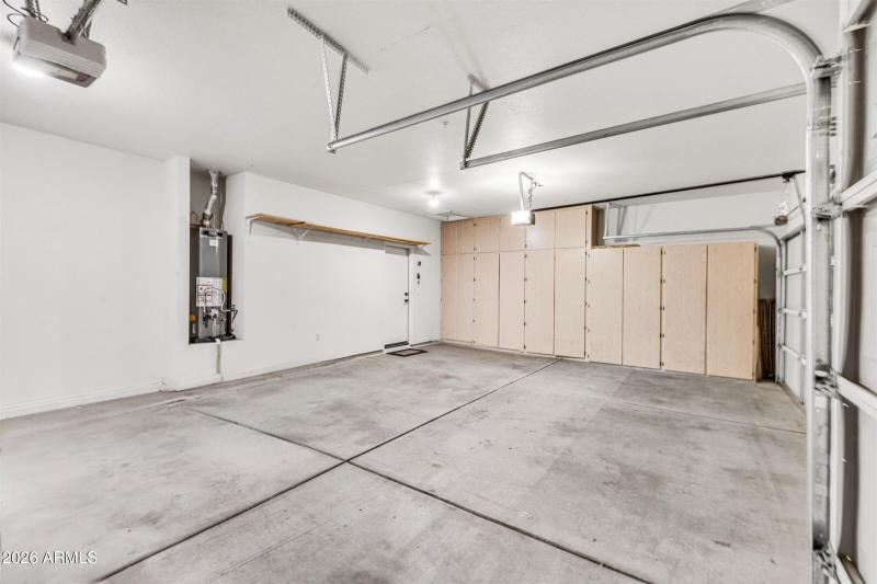 3 car garage w/cabinets