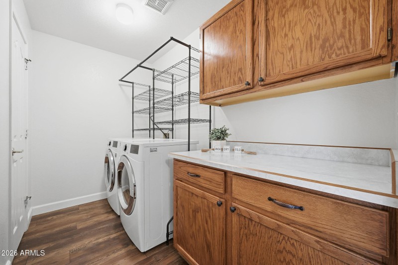 Laundry with Extra Storage Room On Left