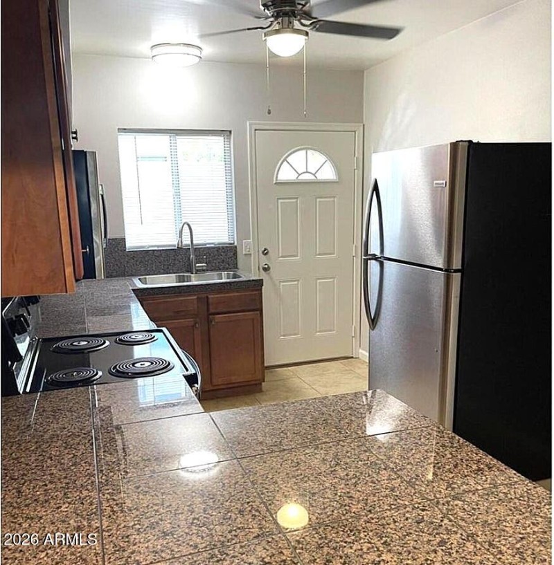 Spacious kitchen with natural light.