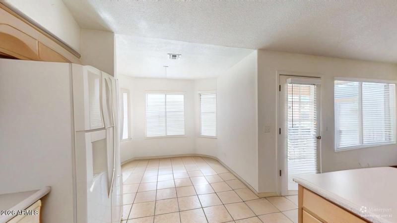 Breakfast nook and kitchen DEFURNISHED