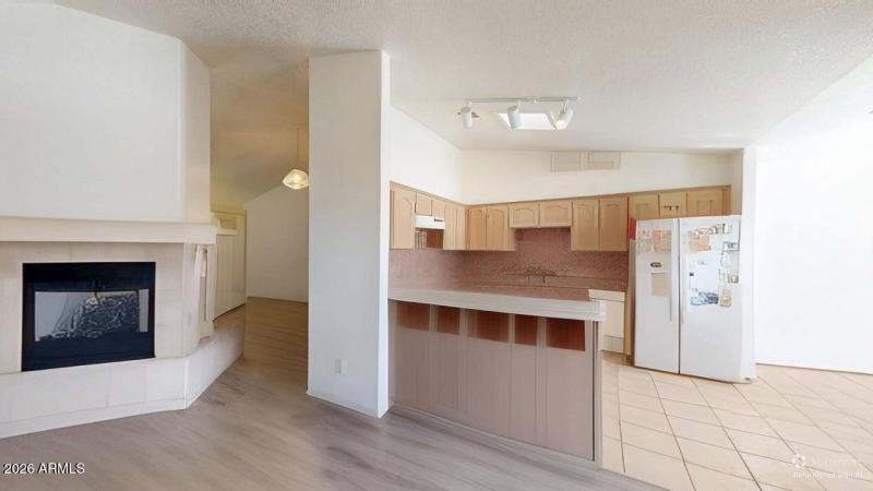 Kitchen and fireplace DEFURNISHED