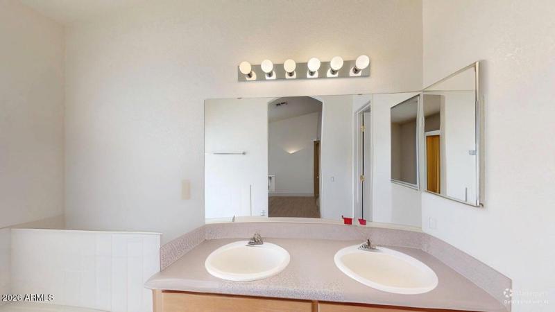 Main restroom double sink DEFURNISHED