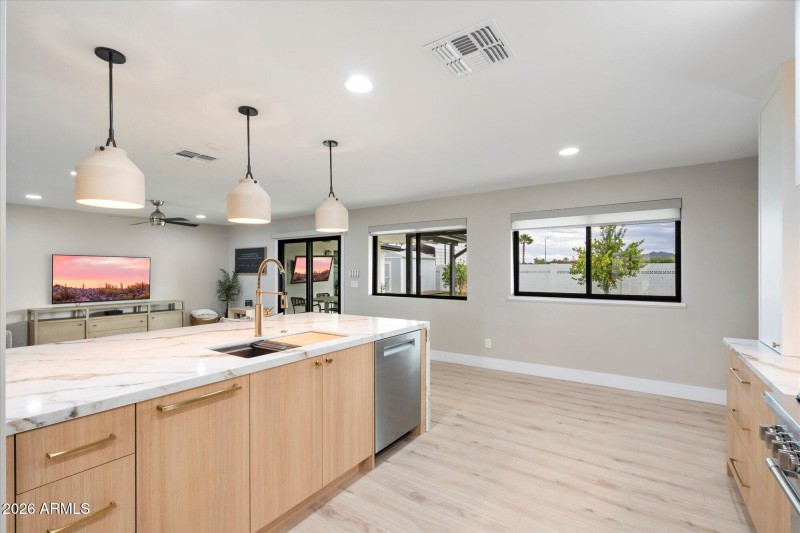 Island w Pendant Lighting & Bkyd View