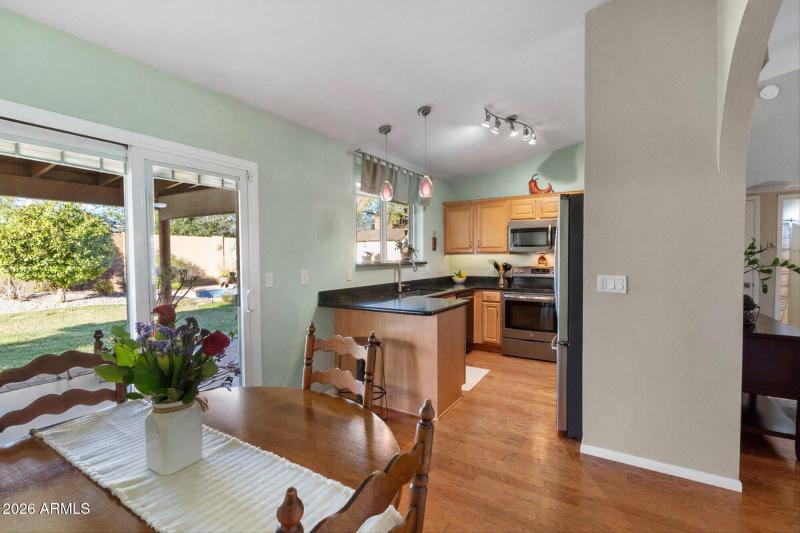Bright Dining Area w Backyard Access