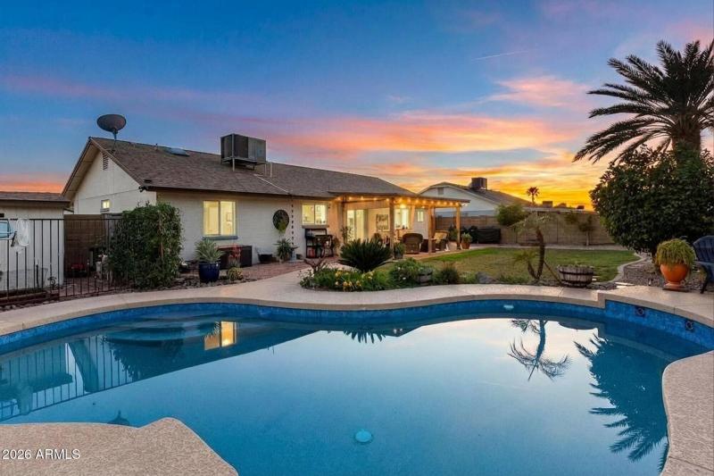 Covered Patio & Pebble-Finish Pool