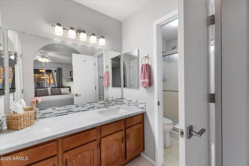 Bathroom w Marble Countertop