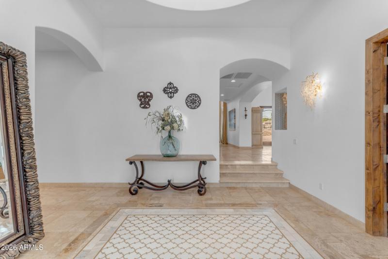 Entry with custom tile and lights