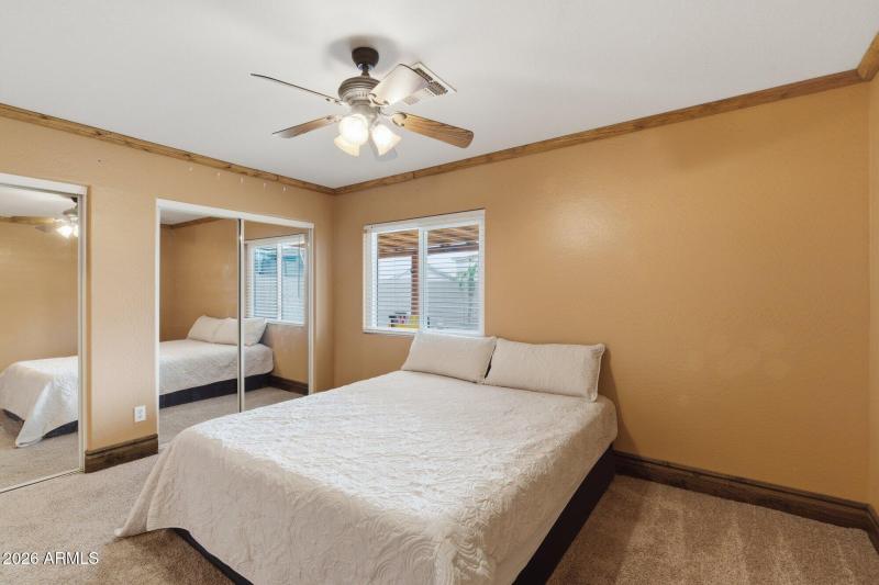 Primary bedroom and closets (1)