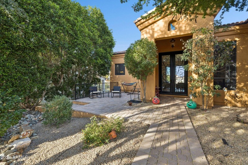 Lush Landscaping Hugs the Paver Walkway