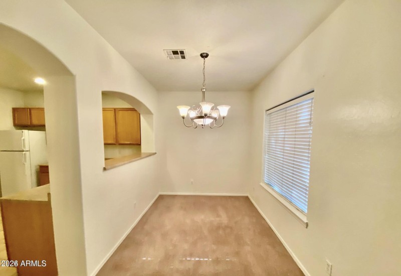 Dining Area with Kitchen Pass-Through