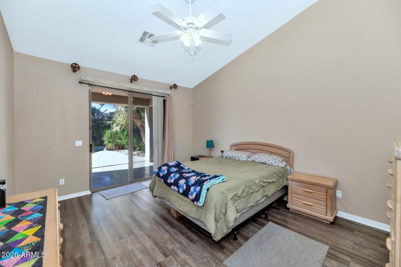 Primary Bedroom w/ exit to backyard