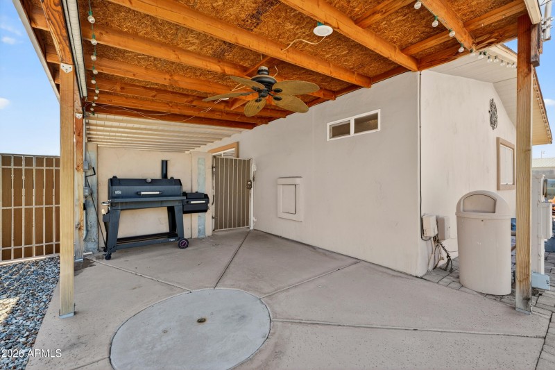 Covered Patio behind Carport Gate