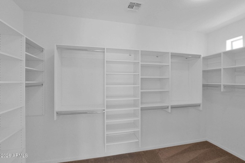 25 Downstairs Master Closet