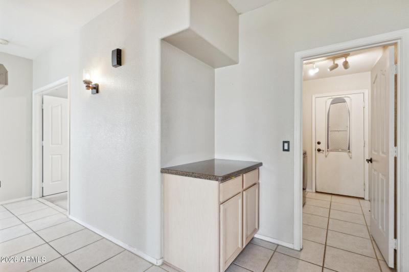 Hall to laundry room view