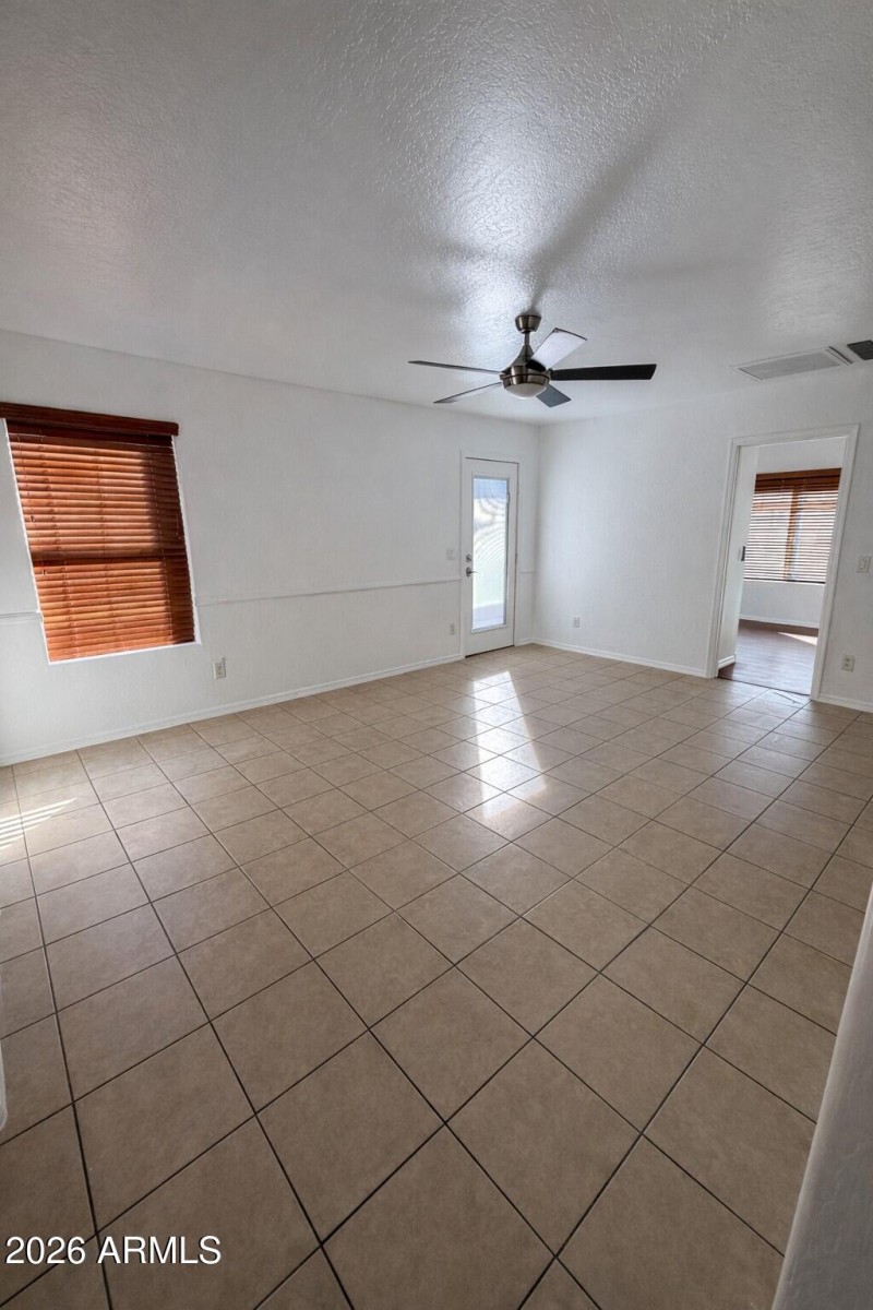 Empty modern living room with fan