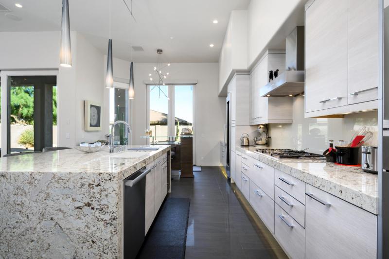 Gorgeous Stone "waterfall" counters