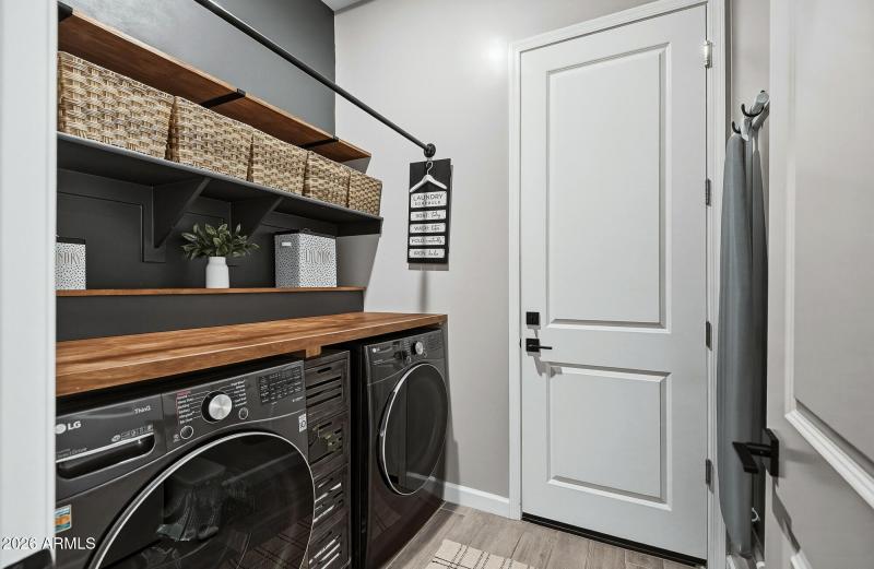 Laundry Room with Built In Shelving