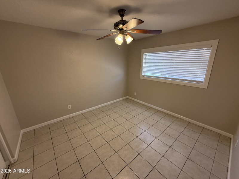 Bright Bedroom With Ceiling Fan