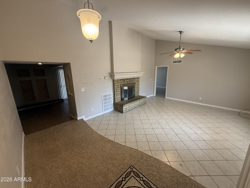 Bright Living Area With Fireplace