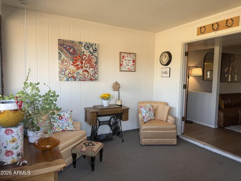 front enclosed patio with furniture