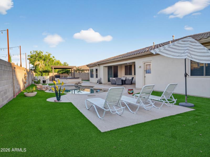 Backyard Pool and Lounge Area