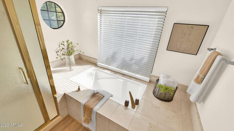 Soaking Tub With Travertine Surround