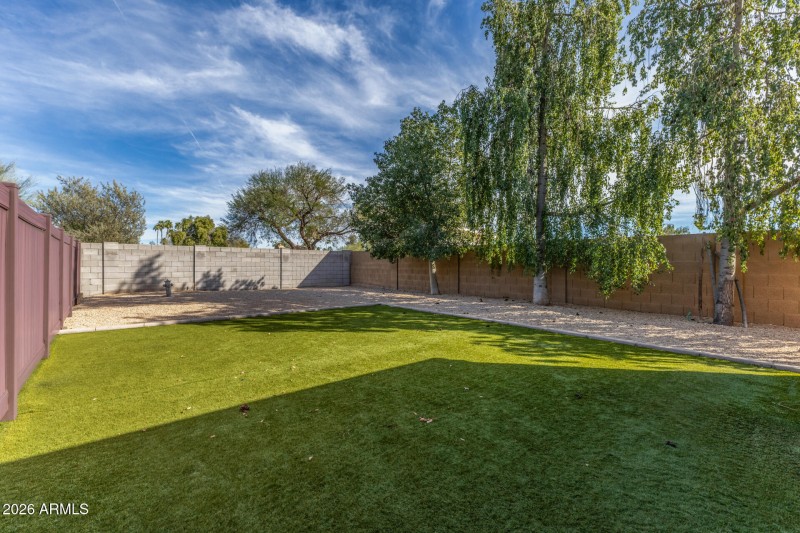 Generational Suite fenced backyard