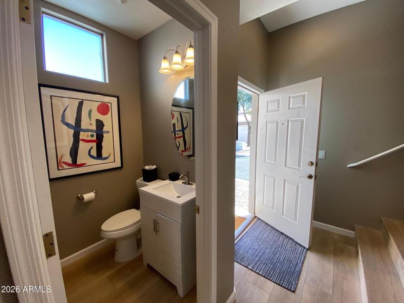 convenient half bath at front entrance