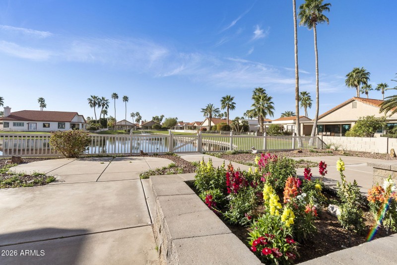 Large patio and raised flower beds